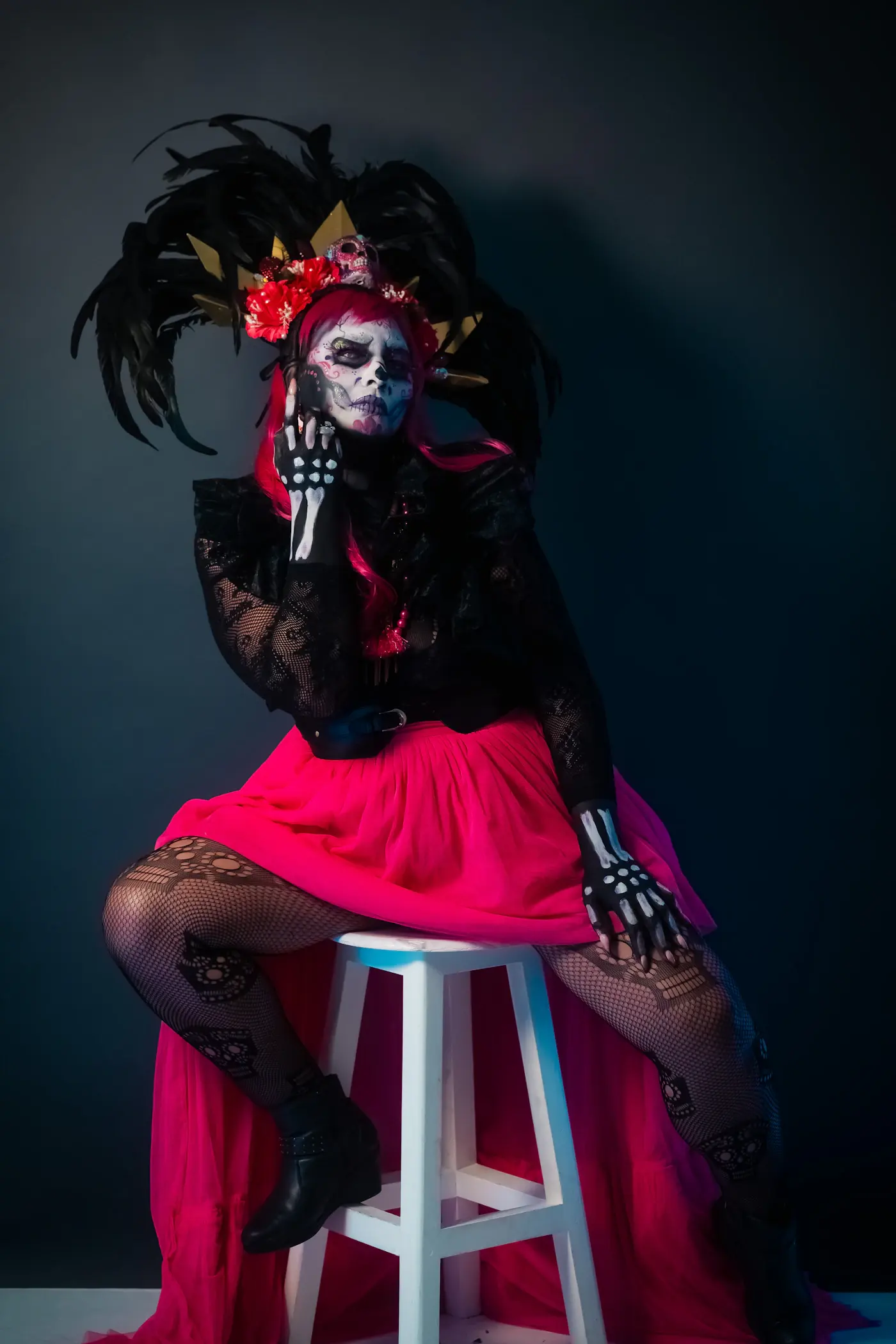 A costumed performer with elaborate makeup and accessories
